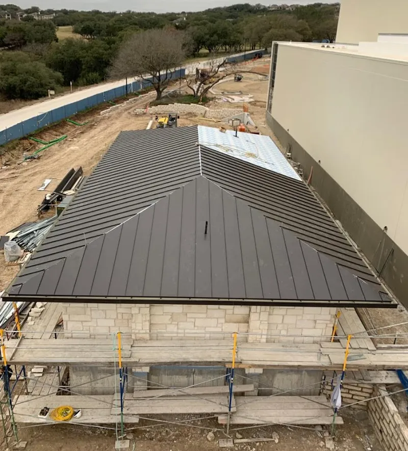 Metal roof new construction with scaffolding in Jacksonville